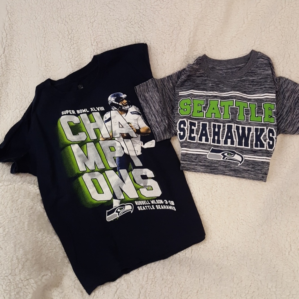 Two Seattle Seahawks kids shirts